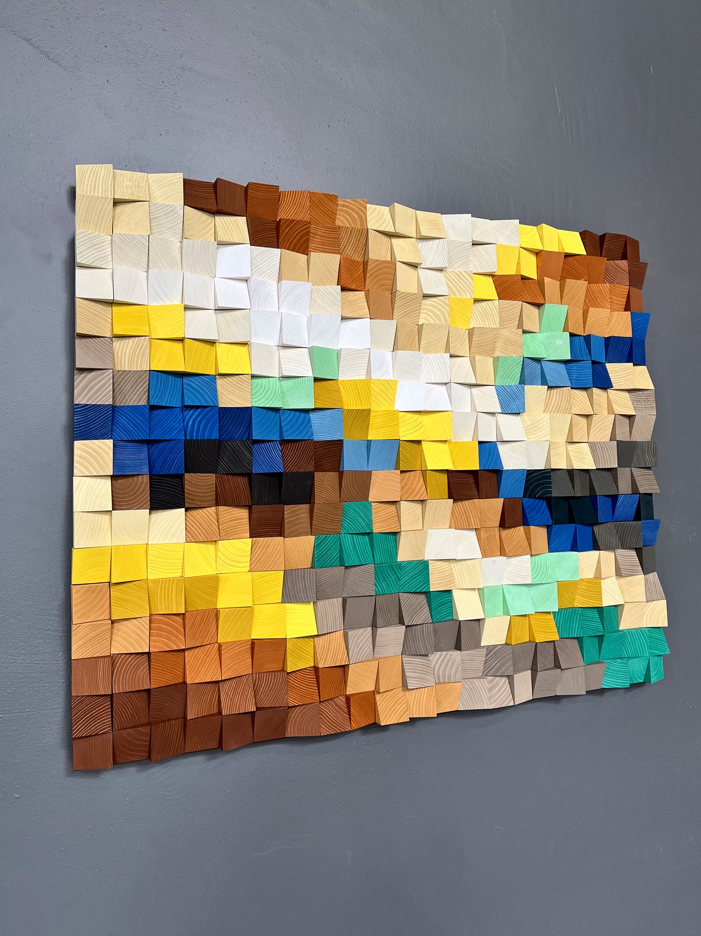 Textured wooden acoustic panel showcasing grain structure and rich color transitions.