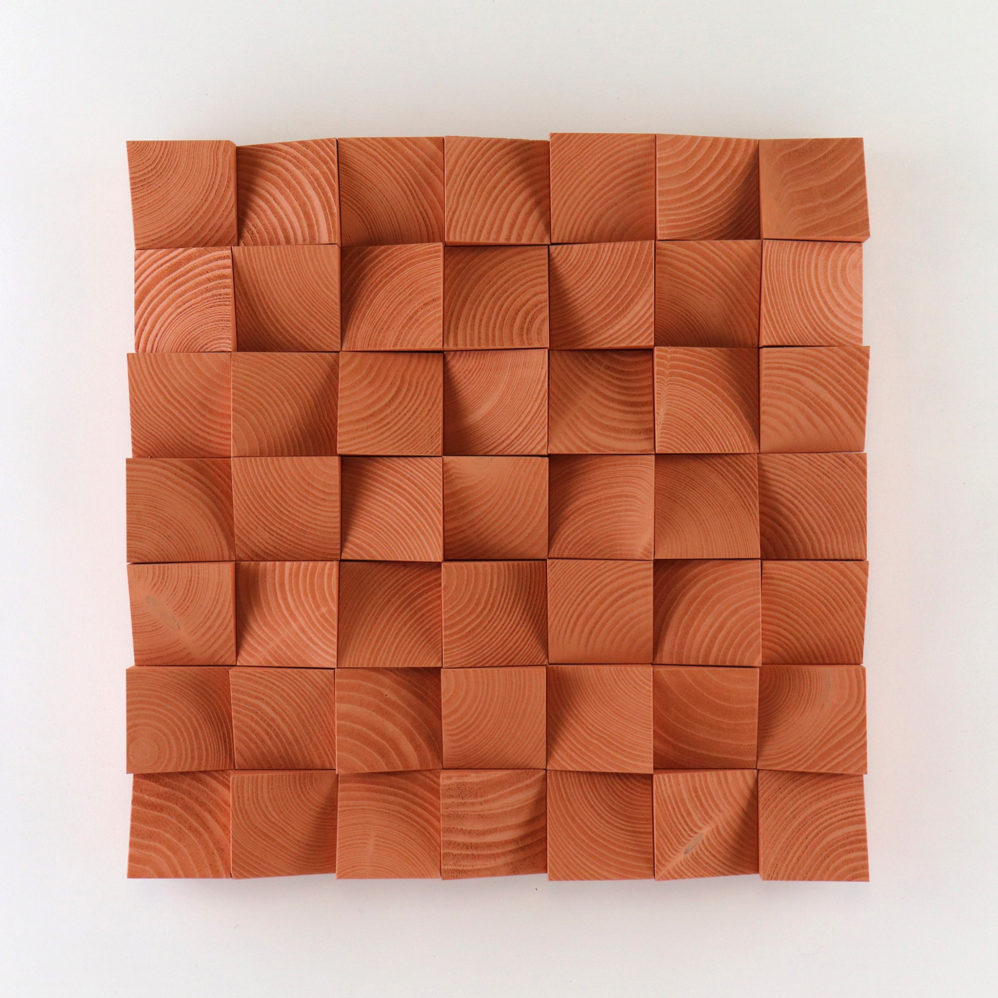 Handcrafted beige red wooden wall art panel with sculpted 3D square blocks and natural wood grain texture