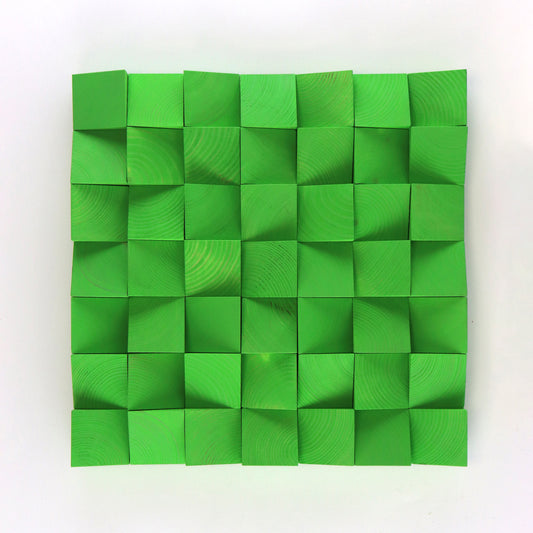Handmade bright green 3D wooden wall art panel with carved geometric blocks and natural wood grain