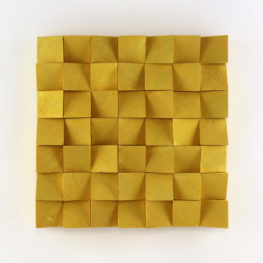 Handcrafted signal yellow 3D wooden wall art panel with raised geometric wood blocks and natural grain texture.