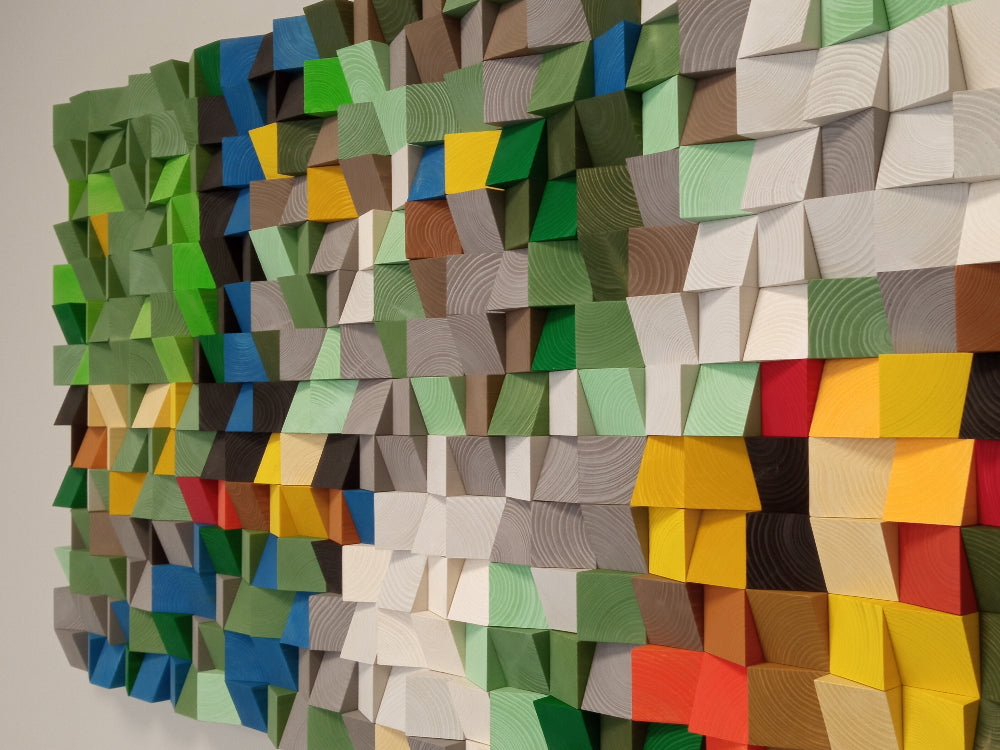 Artistic wood block panel featuring colorful meadow hues and natural grain textures.