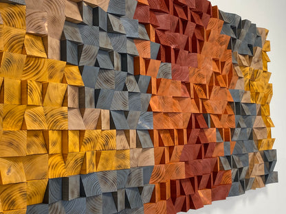 Rustic Burnt Wood Block Art showing a geometric pattern in warm amber and dark gray.