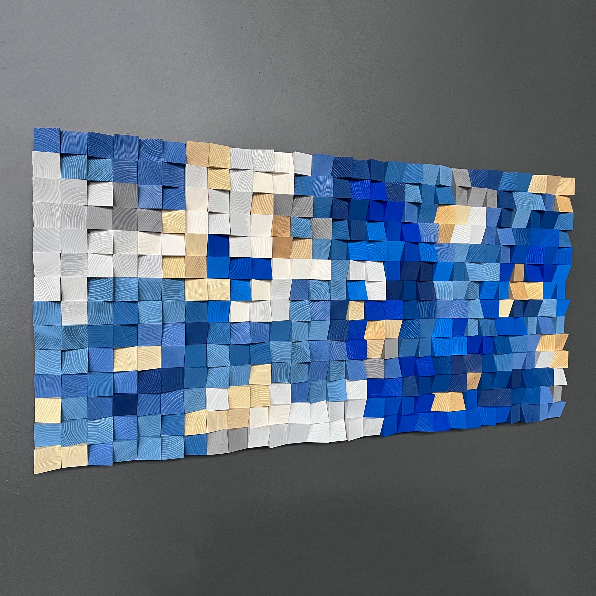 Modern 3D wooden acoustic wall decor blending deep blue, white, and golden colors.