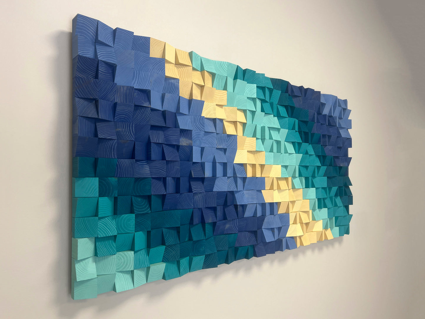 Ocean-inspired 3D wooden wall piece enhancing interior sound and visual aesthetics.