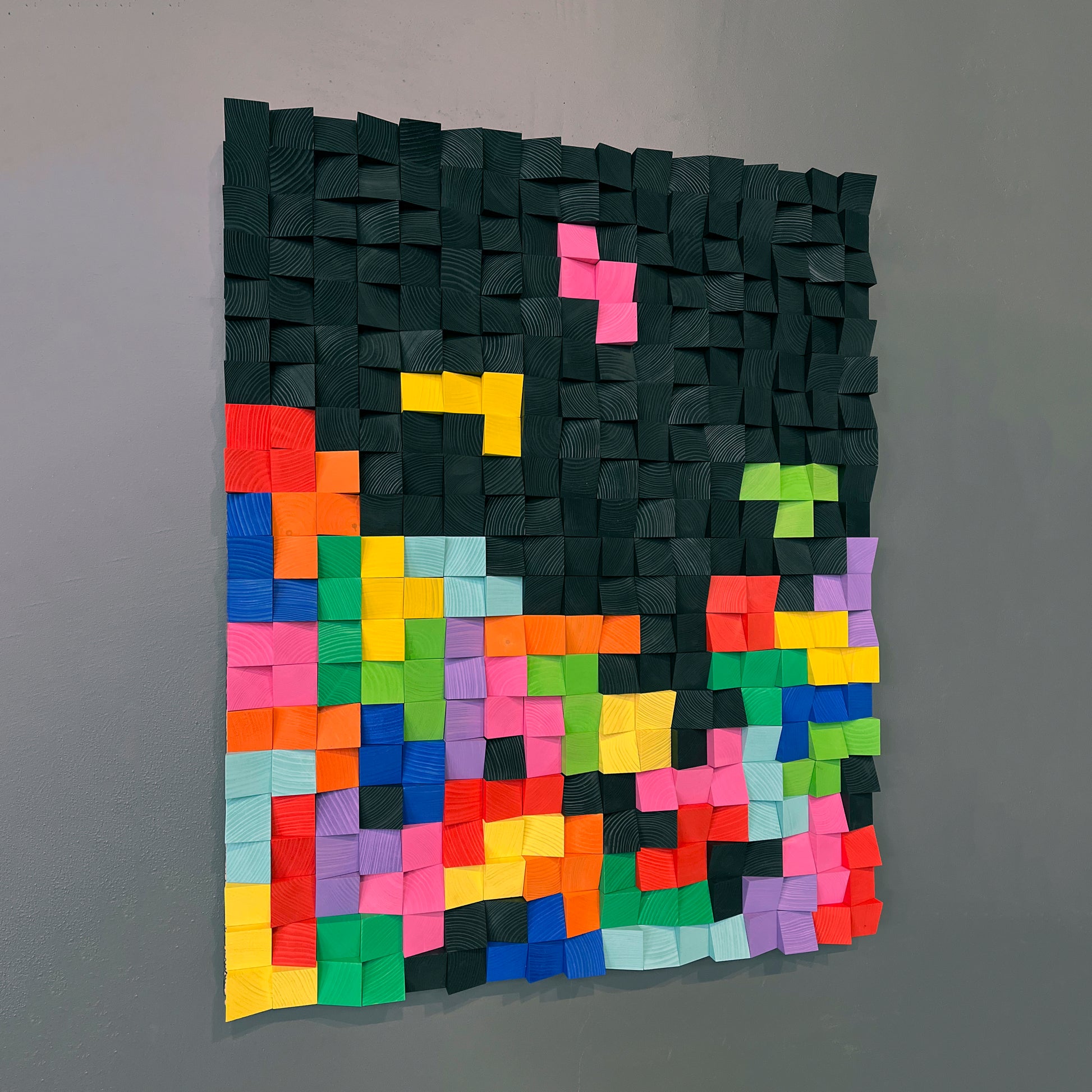 Detailed wooden wall panel by WoodenPix with geometric texture and layered color.