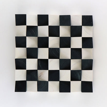 3D wooden checkerboard wall art panel featuring black and white handcrafted blocks.