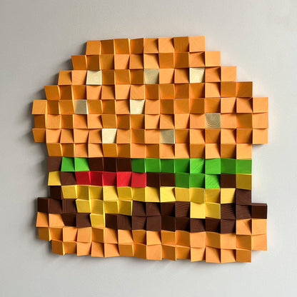 Food-themed cheeseburger wall art assembled from painted wooden blocks in layered composition