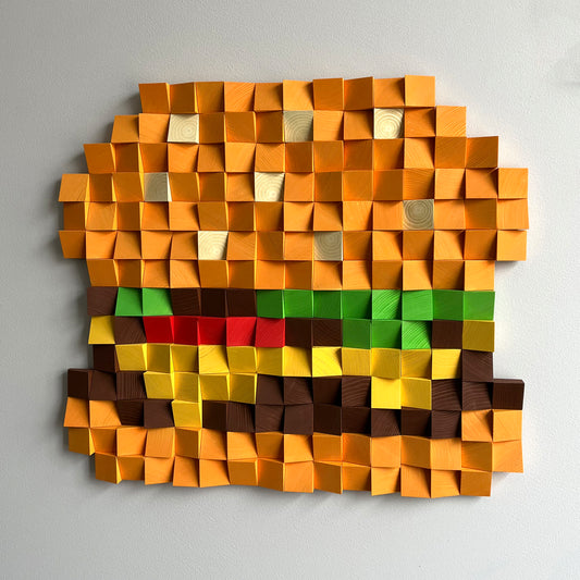 Handmade wooden cheeseburger wall art with layered blocks forming a bold 3D food design