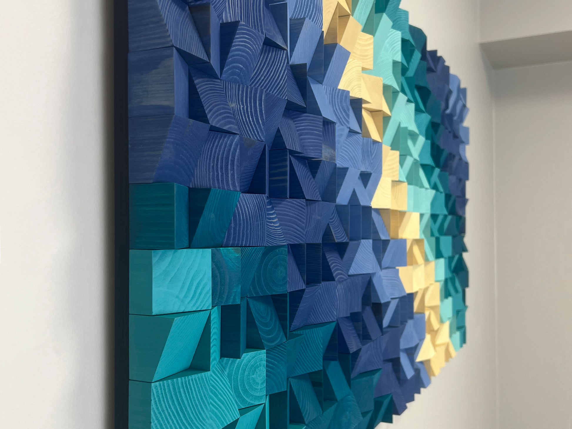 WoodenPix handmade wall decor showcasing blue gradient tones for acoustic enhancement.