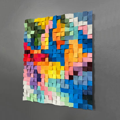 Colorful geometric wooden art panel combining sound diffusion and modern design.