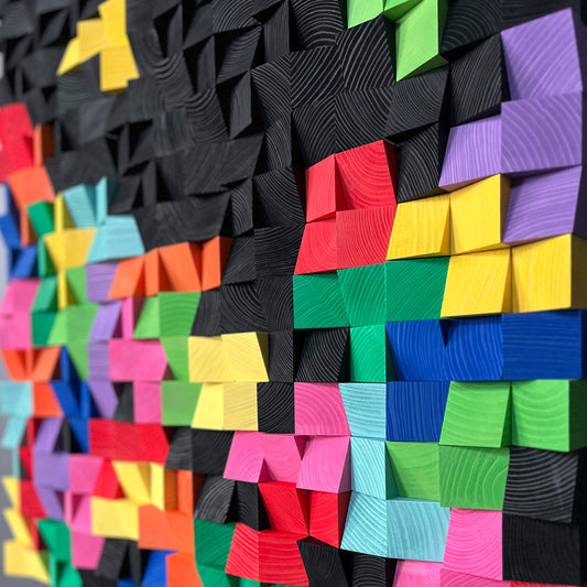 Handcrafted acoustic wall panel with colorful geometric blocks and modern texture.