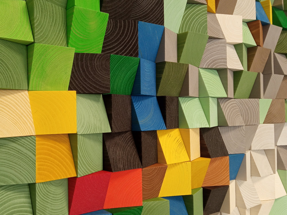Colorful meadow-themed wooden acoustic panel featuring handcrafted geometric wood blocks.