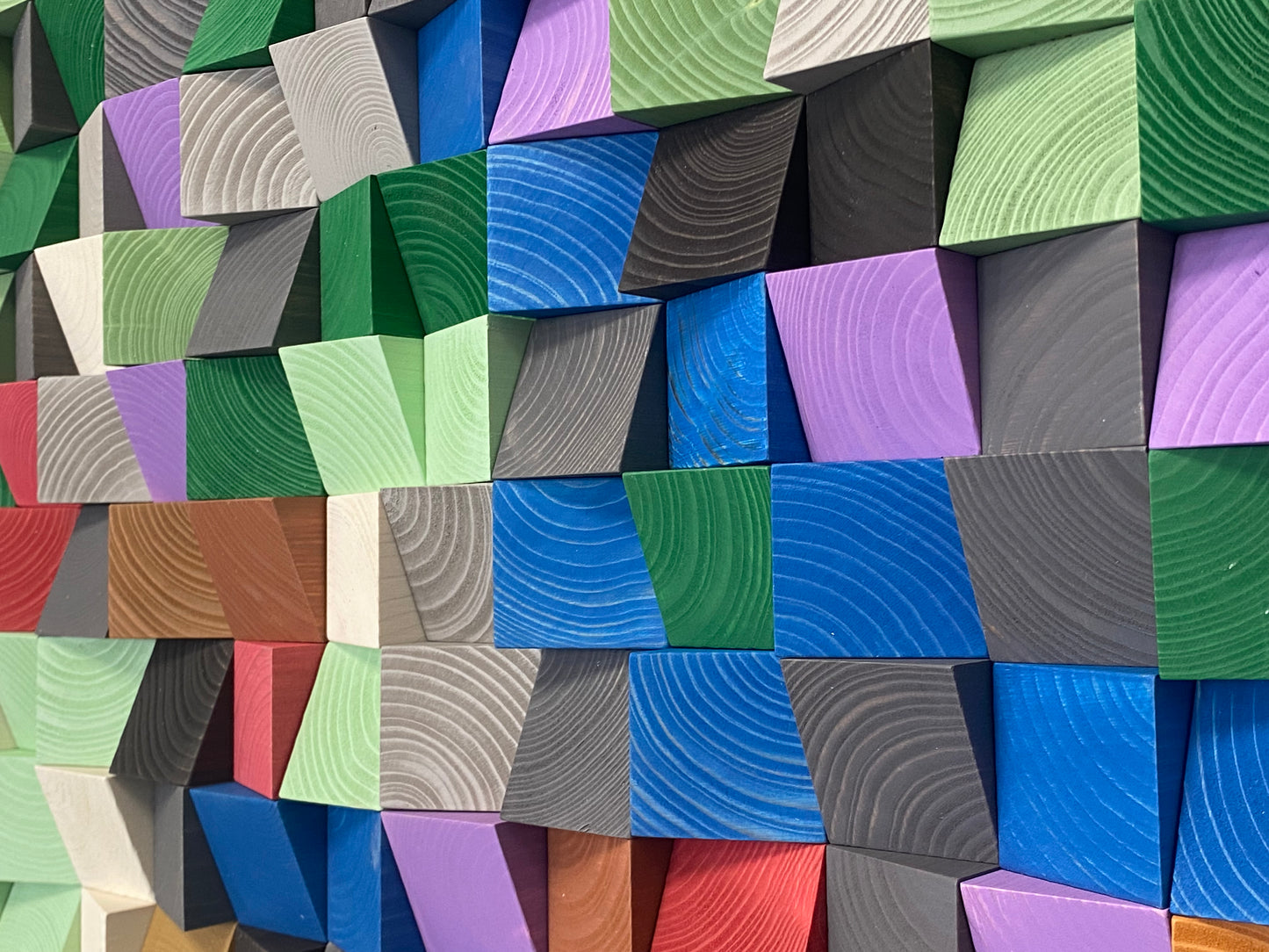 Handcrafted colorful wooden sound diffuser panel designed for modern interiors and echo control.