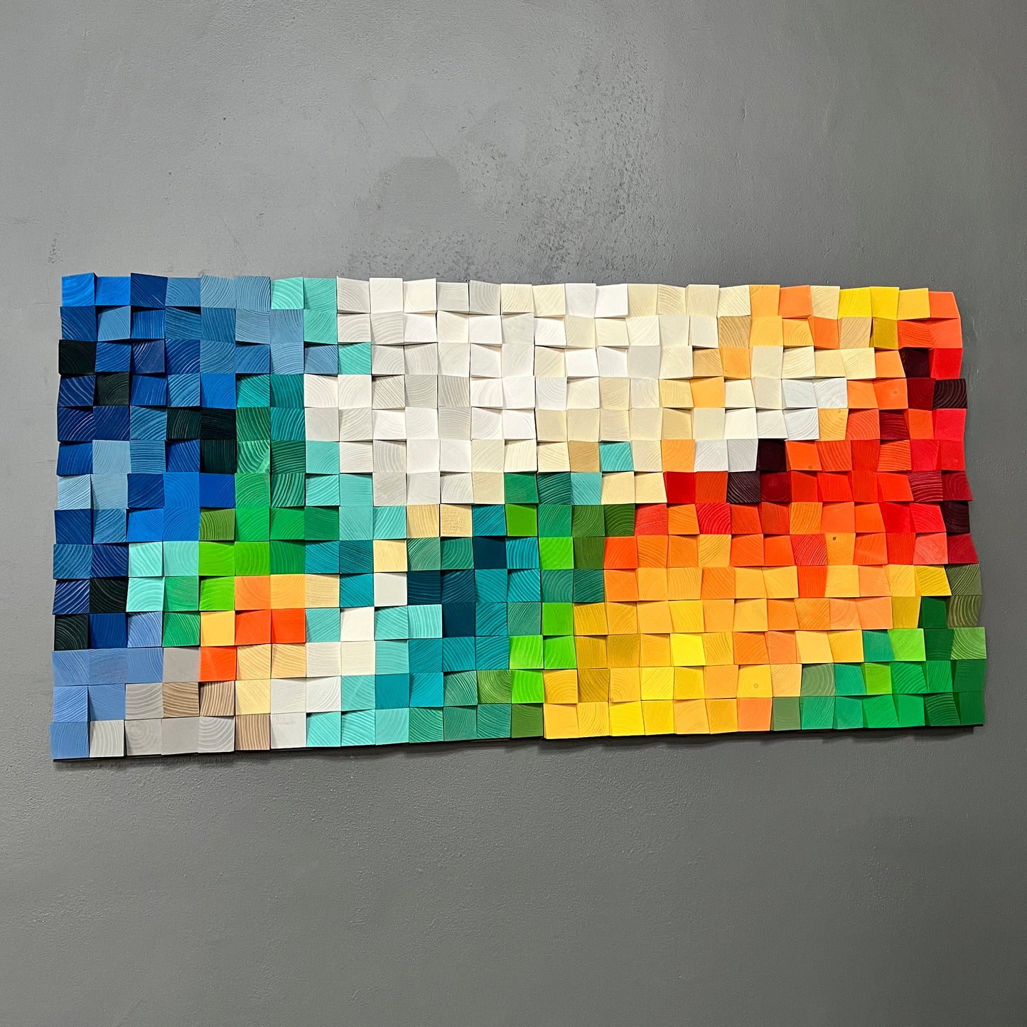 Future Vision wall art featuring handcrafted wooden blocks painted in rich, bright shades.