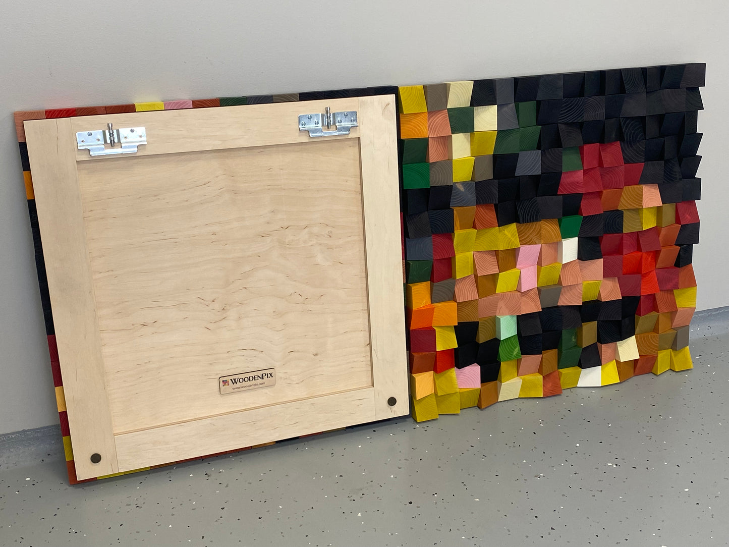 Eco-friendly 3D wooden wall panel by WoodenPix with fruit-inspired color variations.