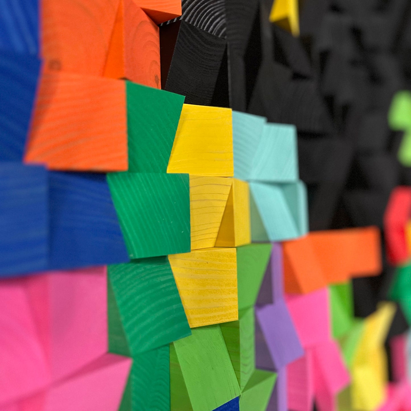 Eco-friendly handcrafted wall decor with vivid neon-inspired color palette.