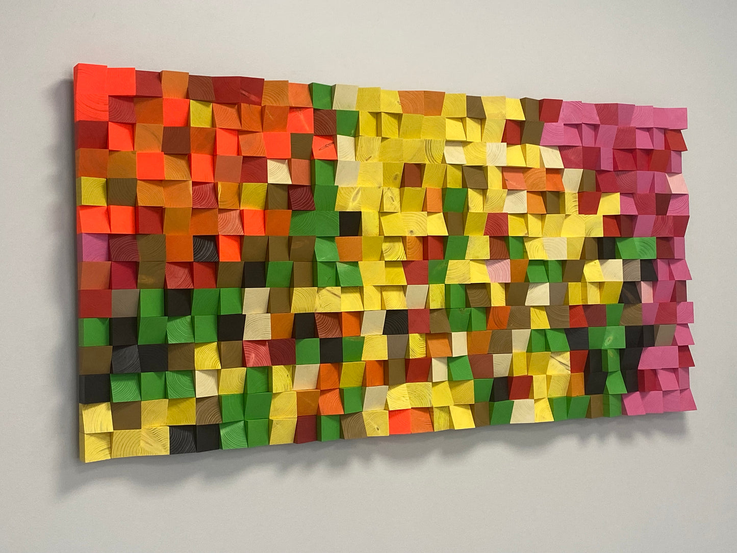 Eco-friendly 3D acoustic wall art with pixel-style composition and bright color palette for sound diffusion.