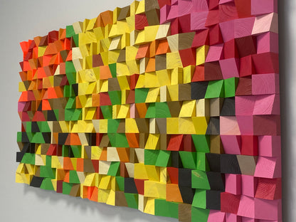 Electric Bloom wooden wall panel combining orange, red, and pink hues in a geometric handcrafted design.