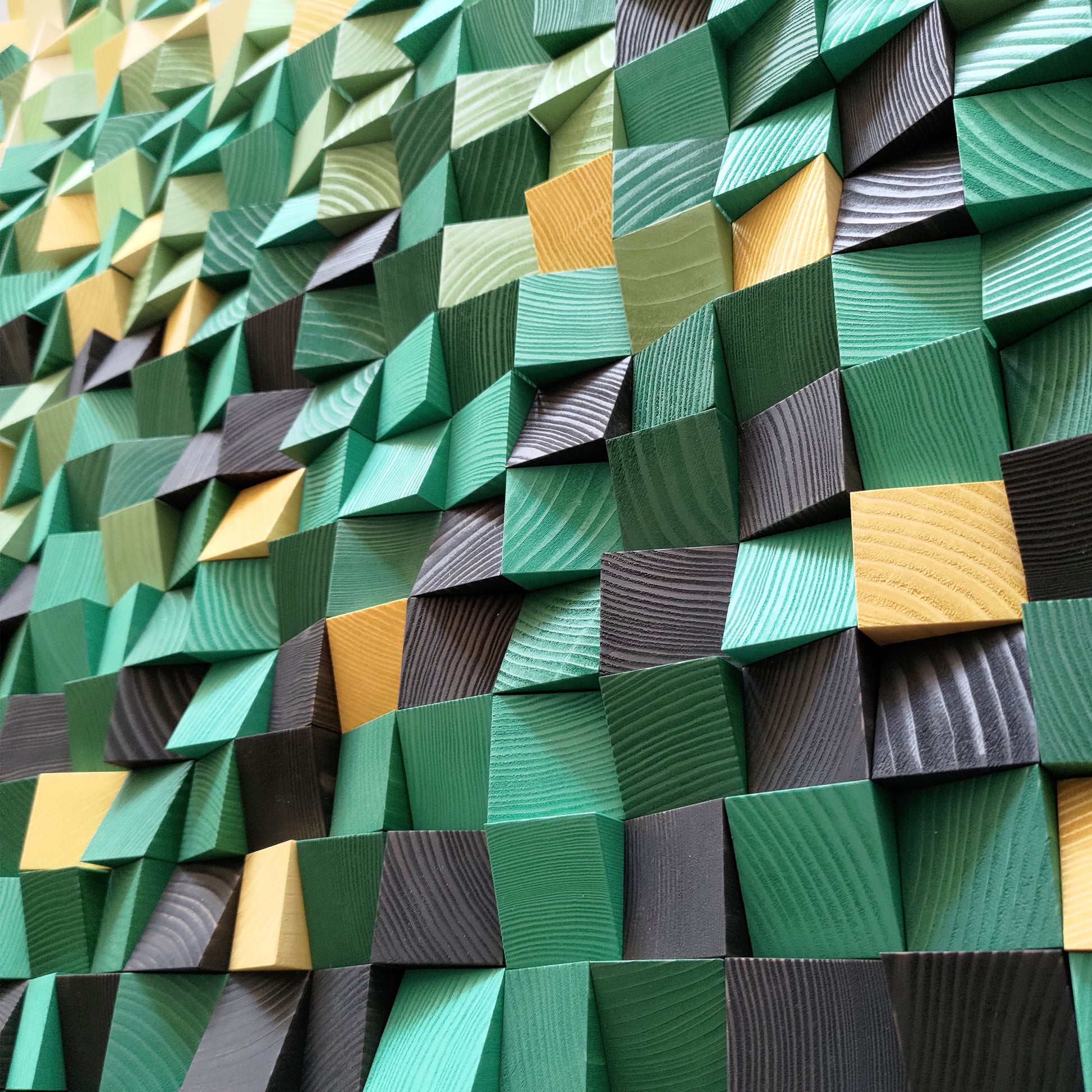 Green gradient wooden acoustic panel with handcrafted blocks and natural wood texture.