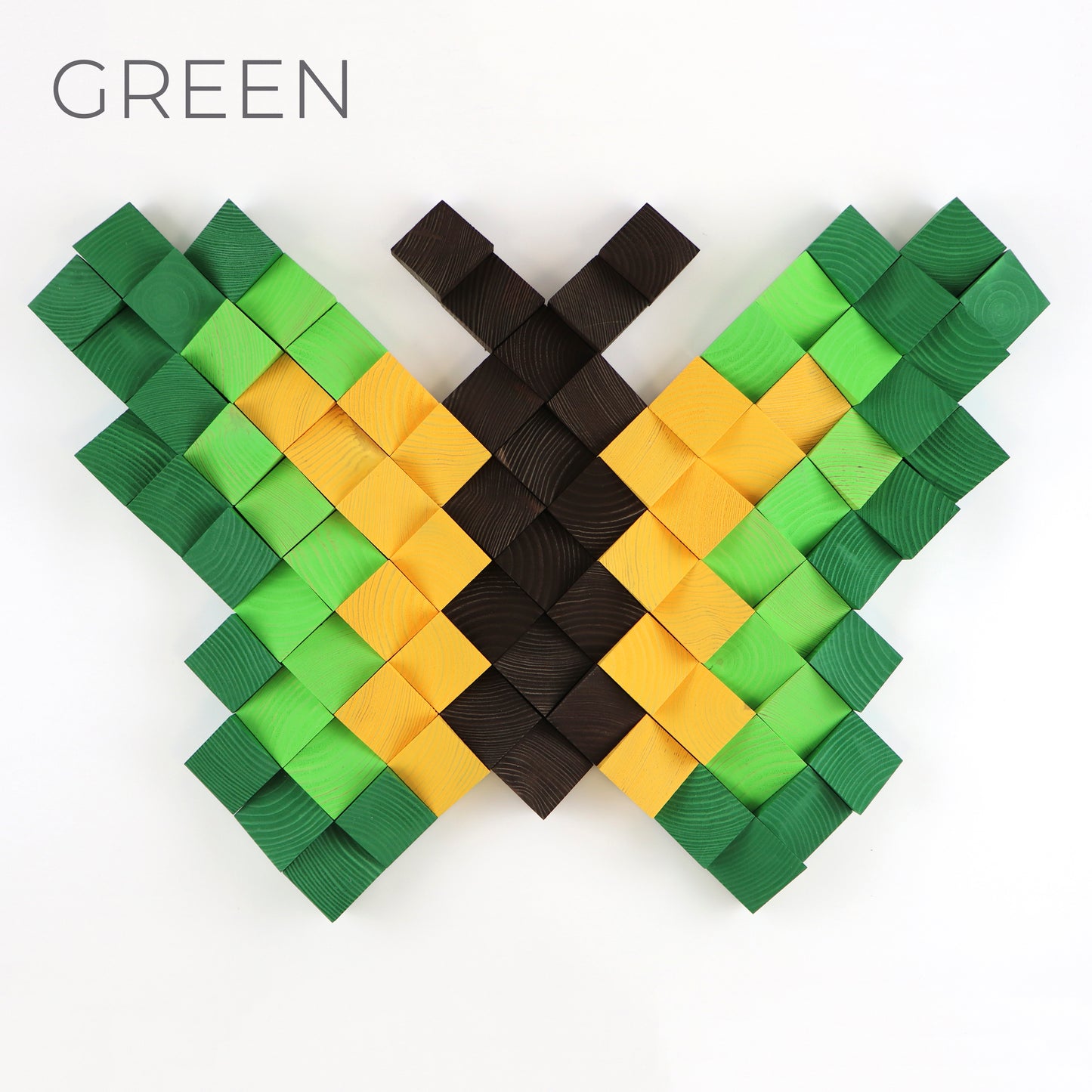 Green and yellow handcrafted wooden butterfly with pixel-style 3D block detailing.