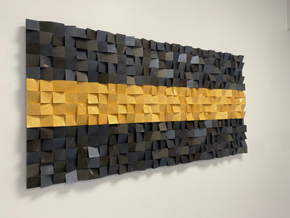 Luxury wooden acoustic wall panel in black and gold geometric design for interiors.