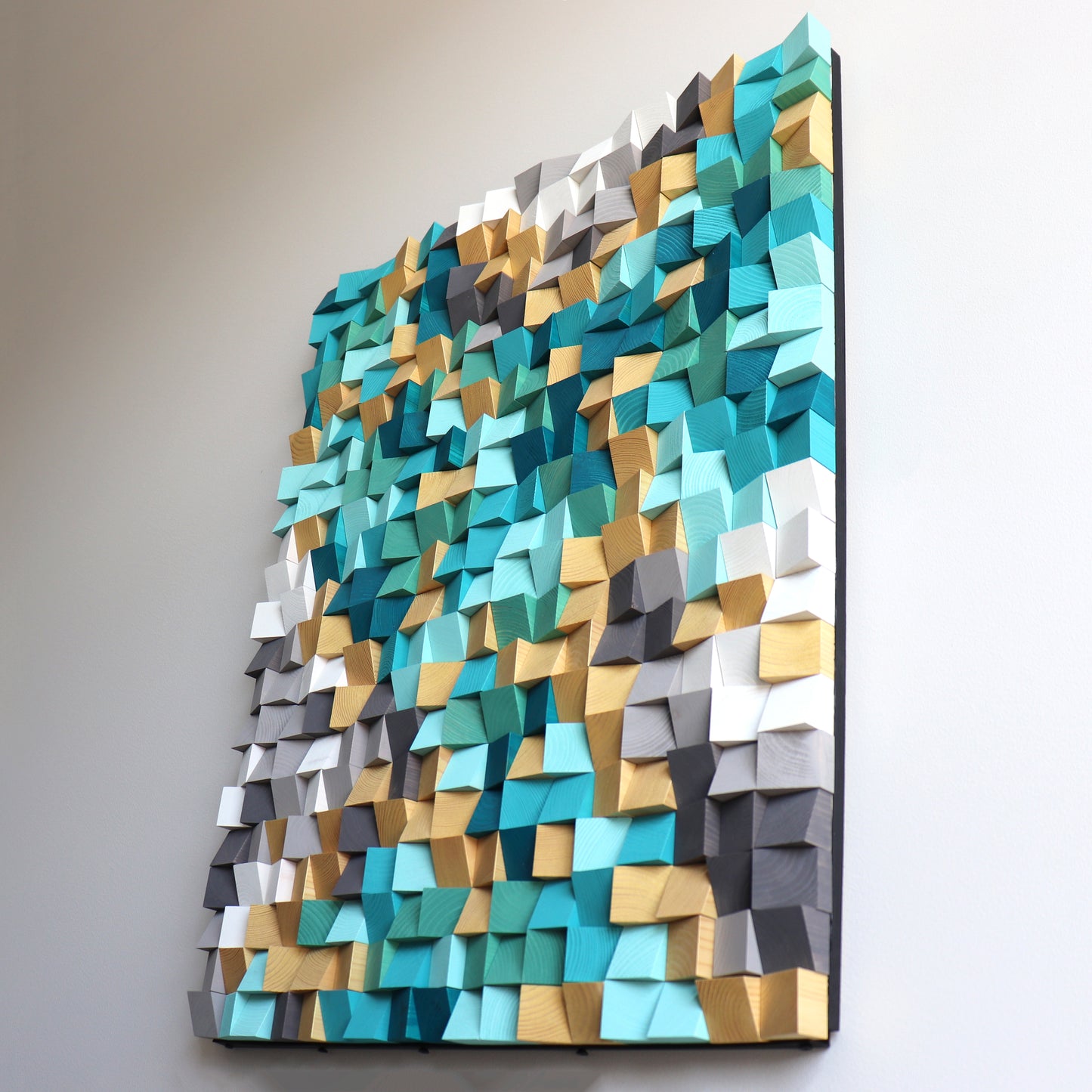Sustainable handmade wooden wall art inspired by ocean waves and modern pixel geometry.