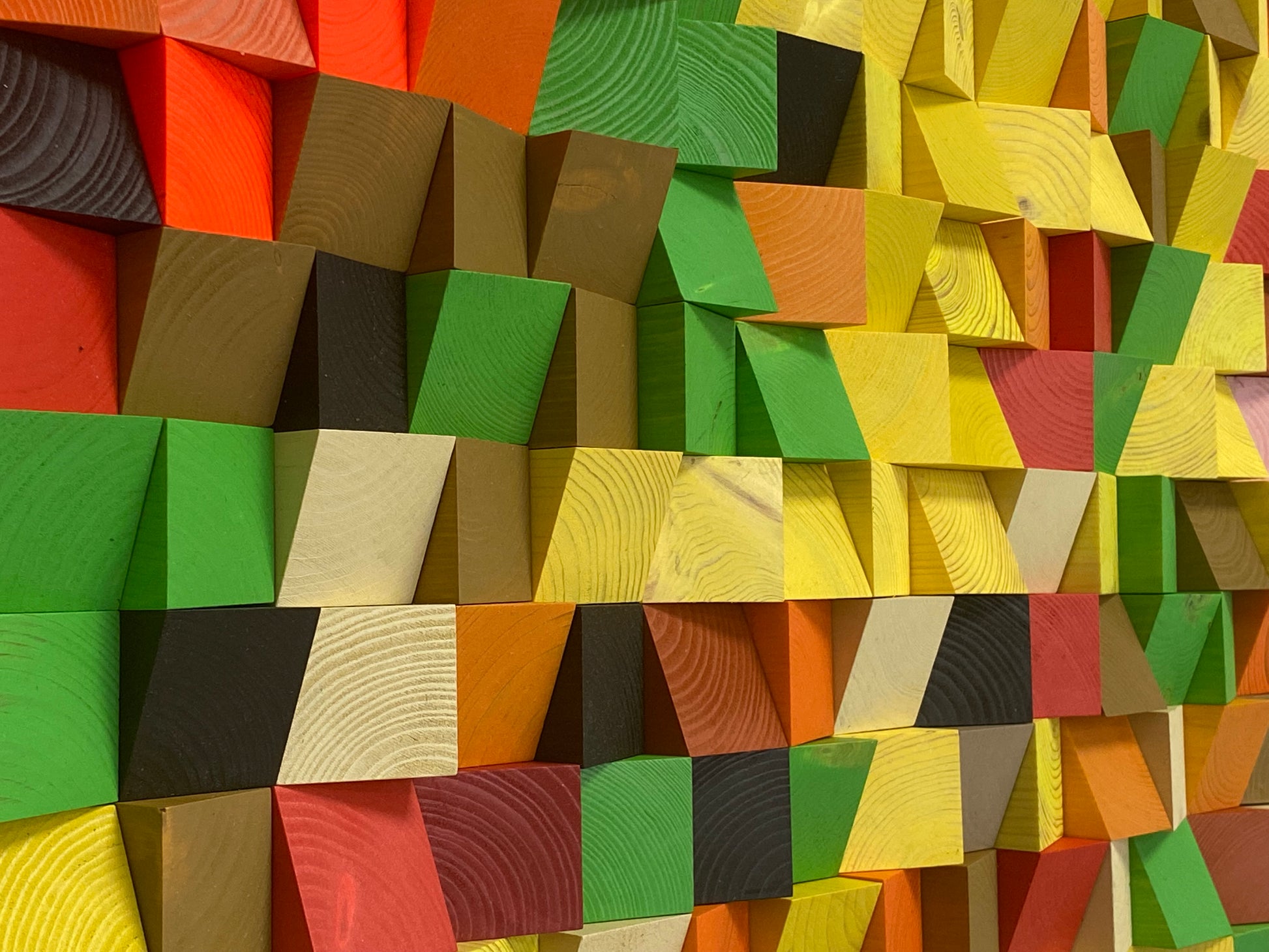 Electric-inspired 3D wall art made of wood blocks arranged in a pixel-style acoustic pattern.