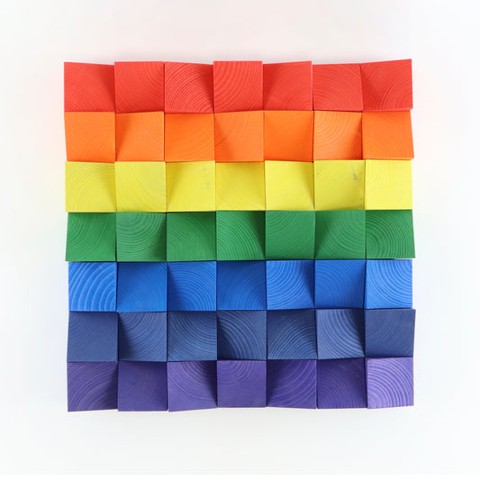 Rainbow 3D wooden wall art panel with handcrafted multicolor blocks.
