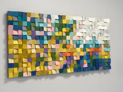 Handcrafted mosaic wood wall piece with rich mixed colors and texture.