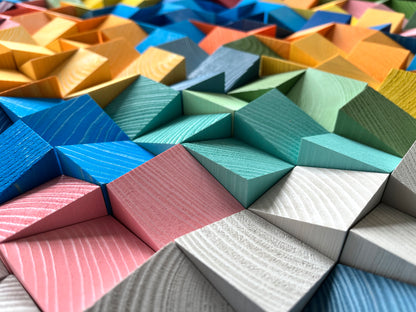 Rainbow-colored 3D wooden acoustic panel designed for modern interiors by WoodenPix.