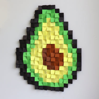 handmade wood block avocado art, highlighting the grid texture and vibrant colors.