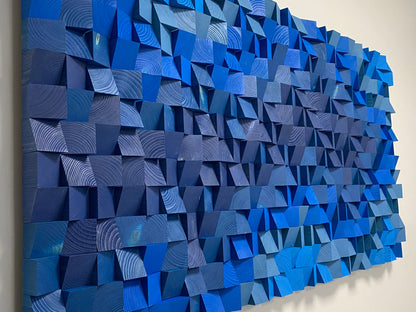 Contemporary ocean-inspired wooden acoustic wall decor in rich blue gradient.