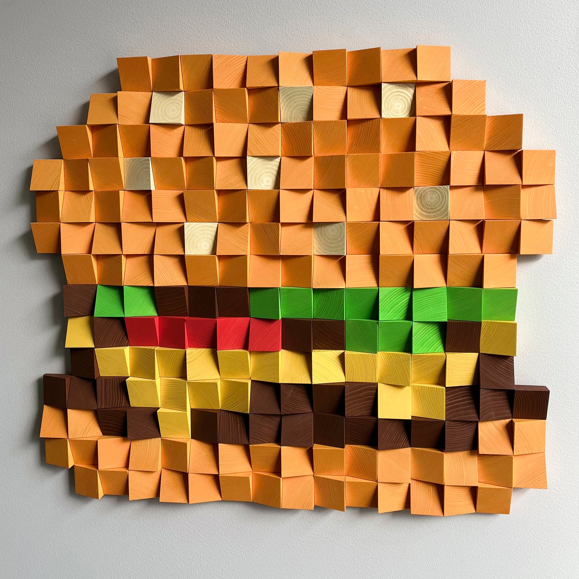 Handmade cheeseburger wall art showcasing natural wood texture and bold color accents