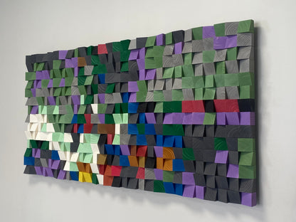 Multicolor acoustic wall panel made from handcrafted wood blocks with natural texture and depth.