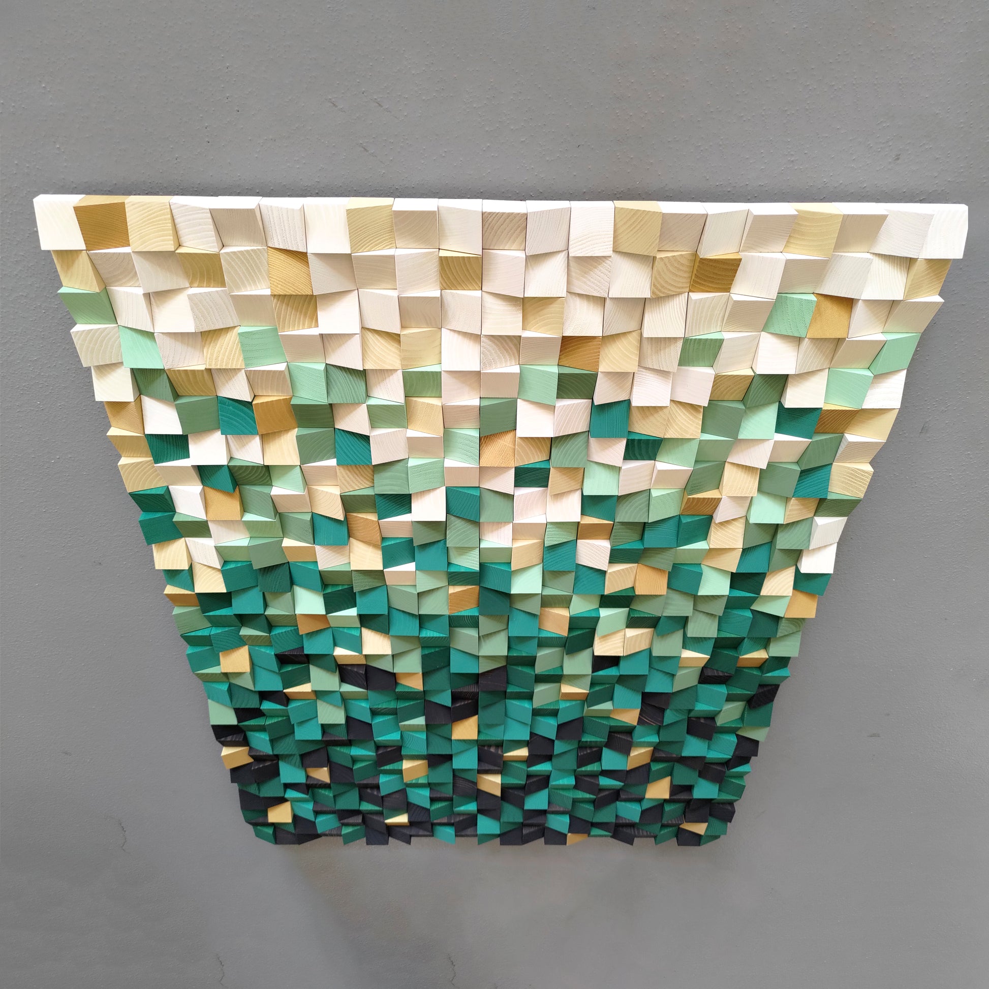 Artistic wood block panel featuring natural grain patterns and layered green hues.