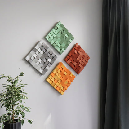 Decorative wall installation featuring four handcrafted wood panels in varied colors.