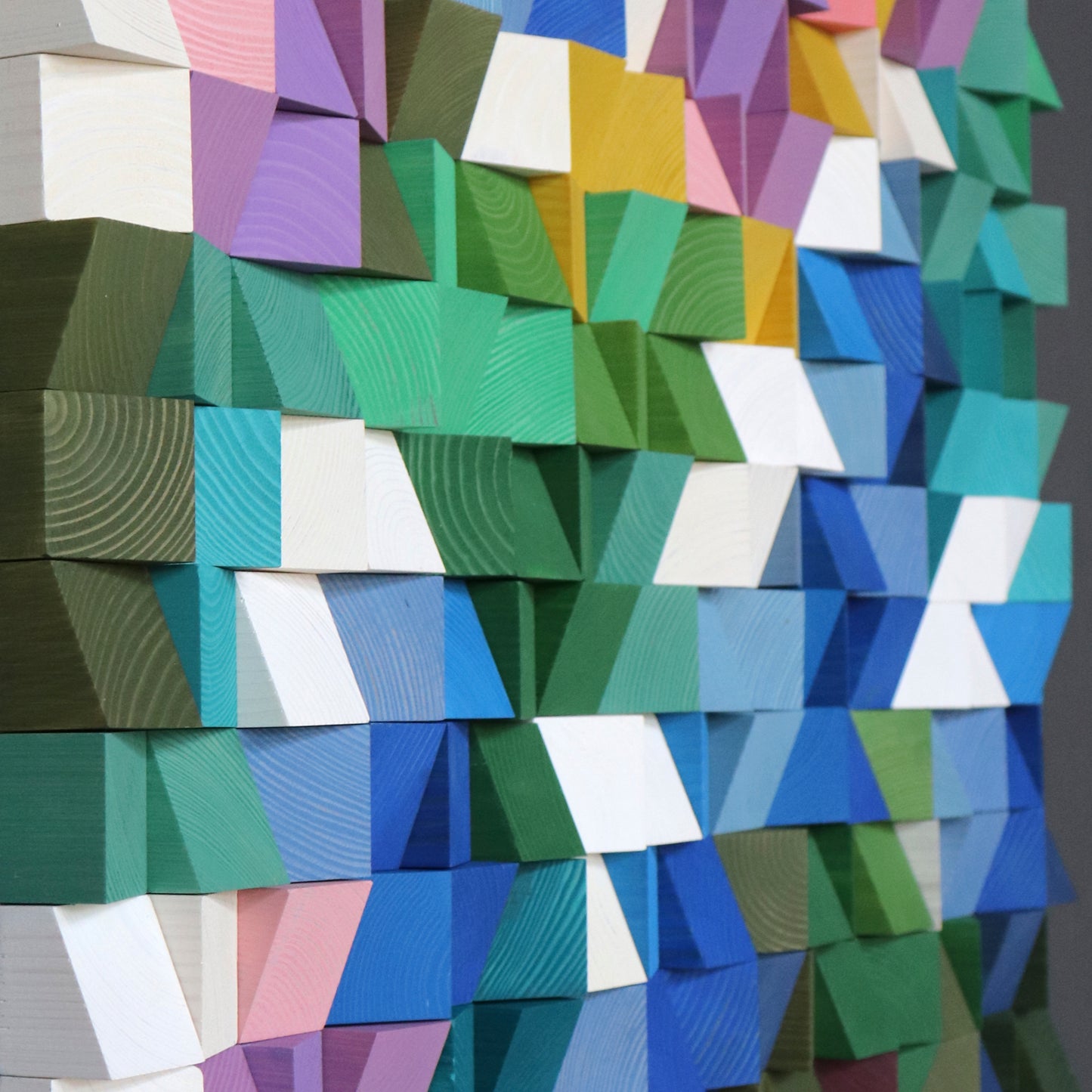 Artistic floral-inspired 3D wooden wall panel combining purple, blue, and pink shades.