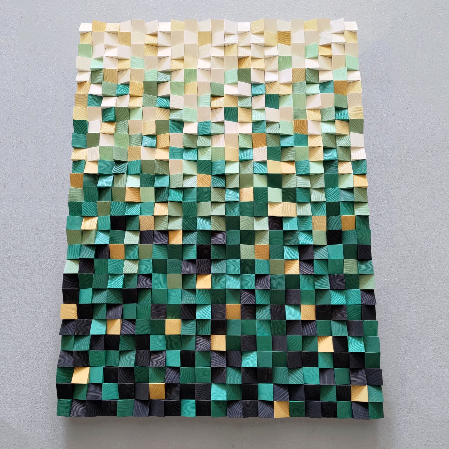 Modern wooden wall decor panel showcasing layered green tones and acoustic depth.