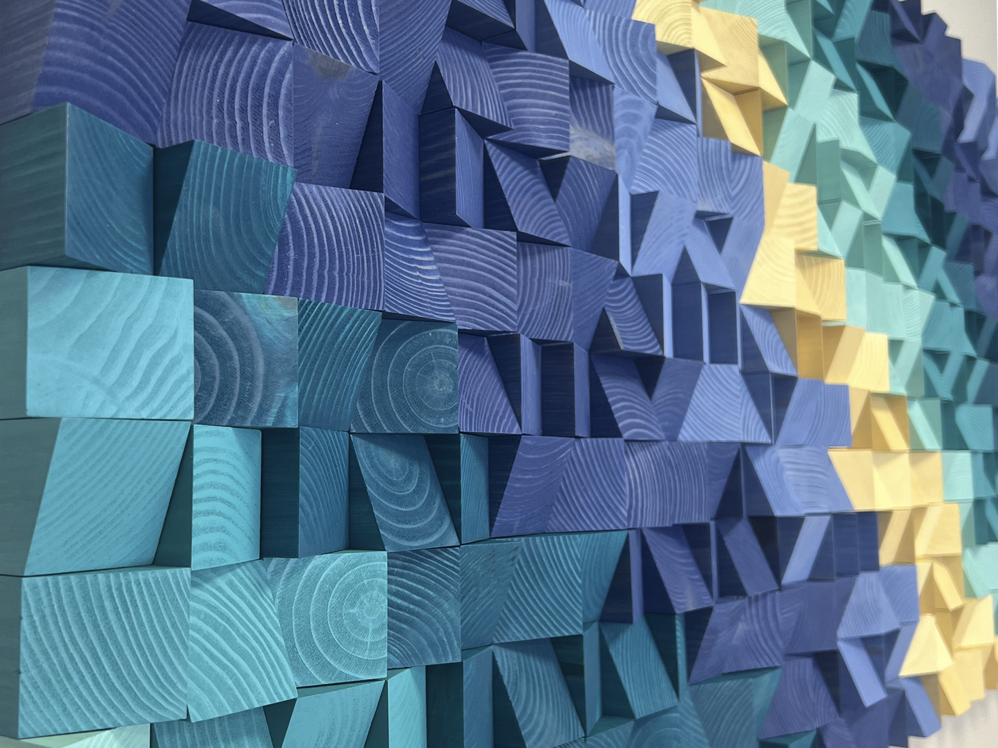 Modern blue and beige 3D wall panel offering texture, depth, and sound diffusion.
