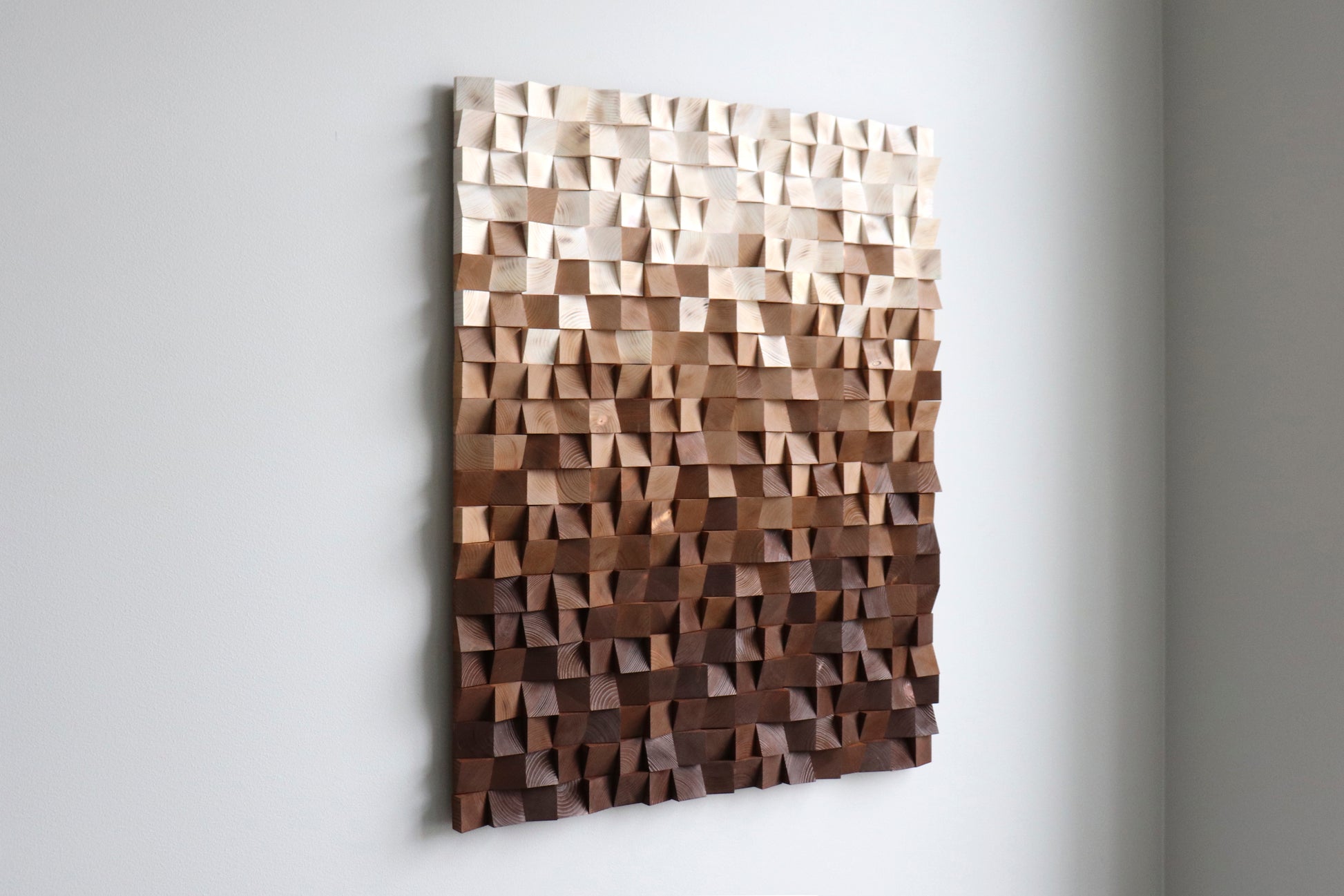 WoodenPix handcrafted wall art with warm brown tones, sculpted blocks, and sound-enhancing depth.
