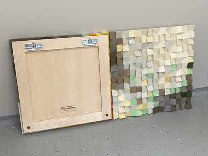 Textured wooden landscape art with warm yellow sun tones merging into mountain neutrals.