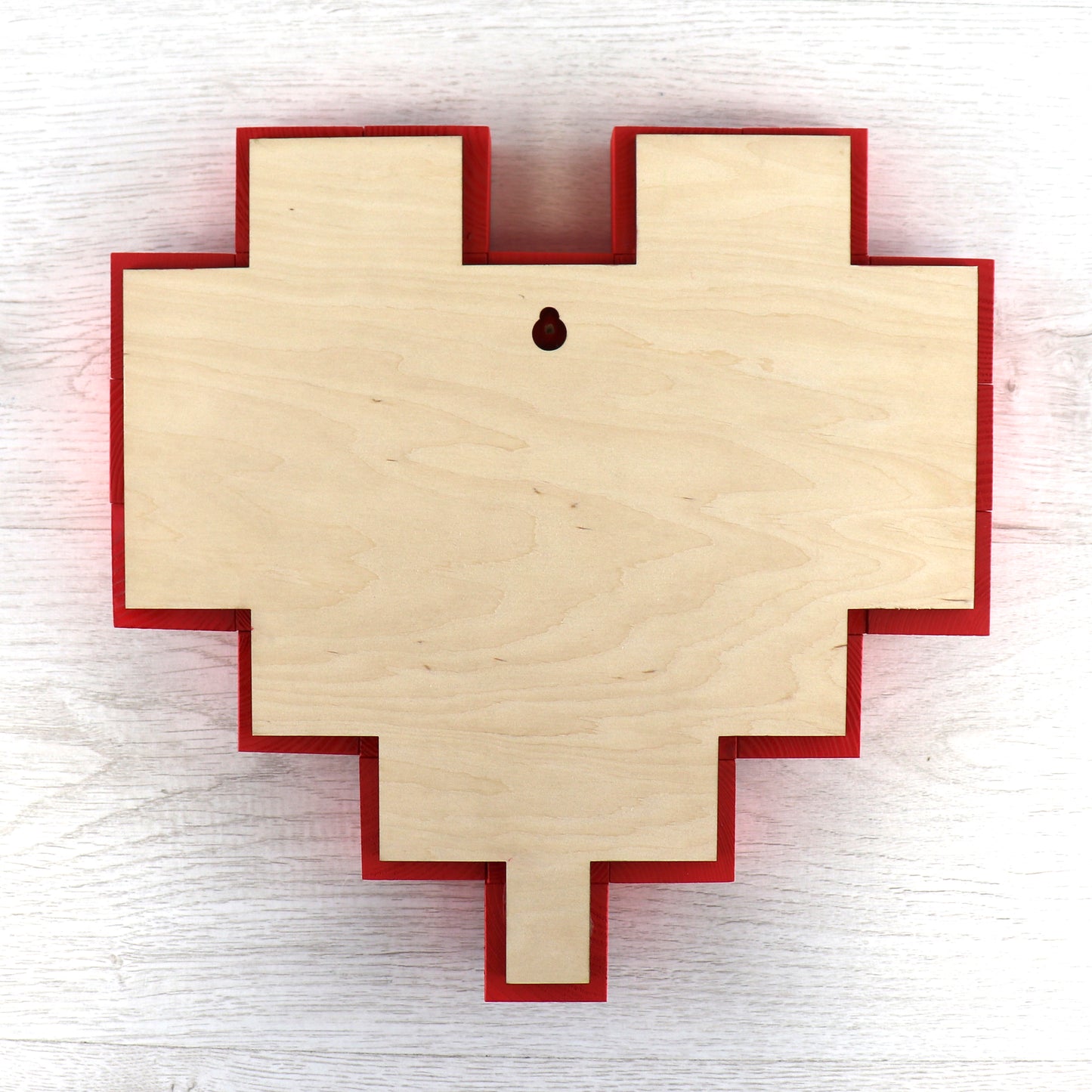 Back view of purple heart wooden wall art showing natural wood backing and hanging detail