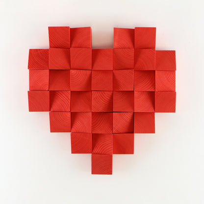 Red 3D heart wall decor crafted from solid wood blocks with sculptural depth