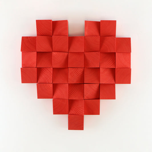 Red 3D heart wall decor crafted from solid wood blocks with sculptural depth