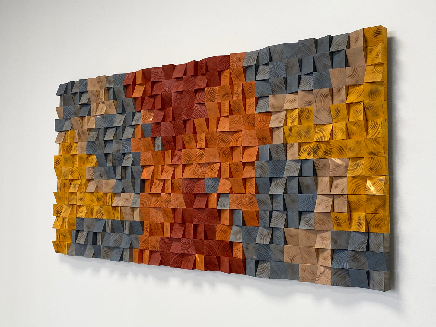 Handcrafted burnt wood wall art with warm colors and detailed wooden patterns.