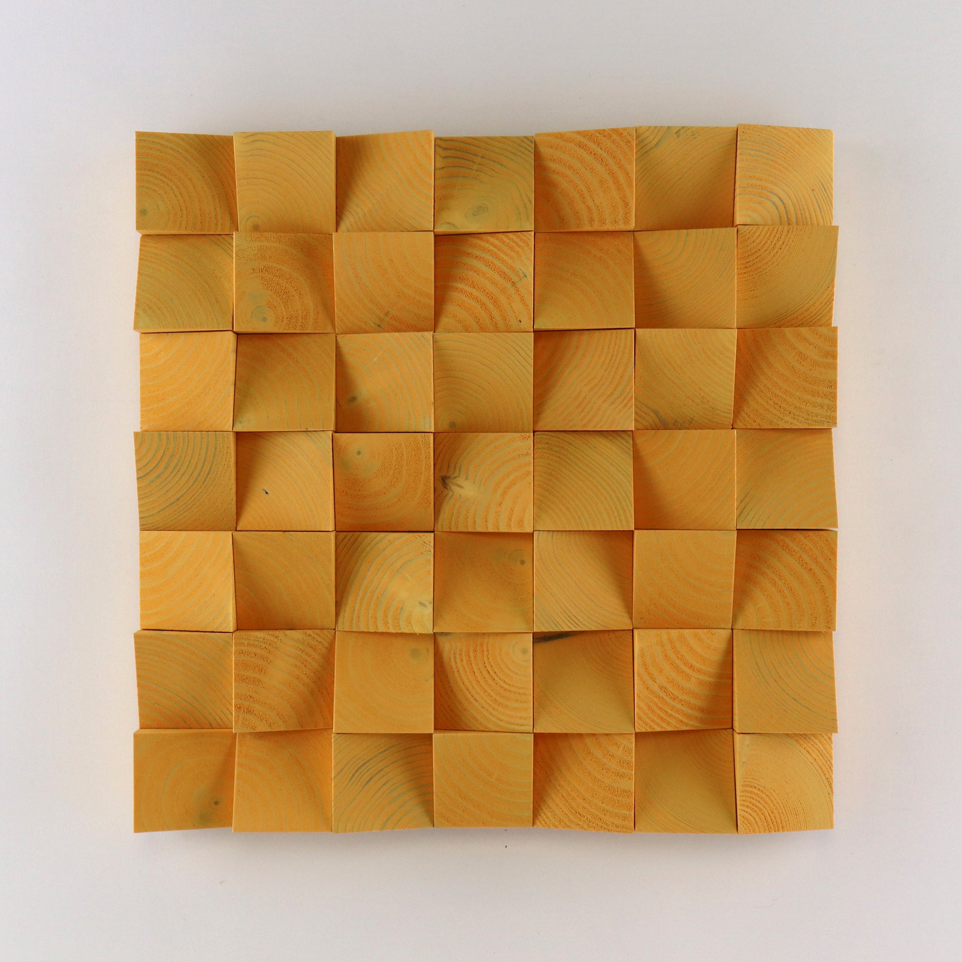 Handcrafted Saffron Yellow 3D wooden wall panel featuring curved carved blocks and a bold warm tone for vibrant modern interior decor.