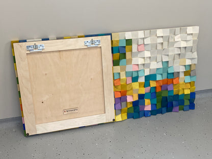 Textured wooden mosaic wall panel with pastel and bright wood tones.
