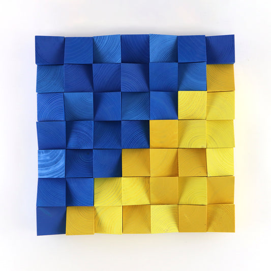3D wooden wall art panel in blue and yellow tones inspired by the Ukrainian flag, handcrafted with geometric wood blocks.