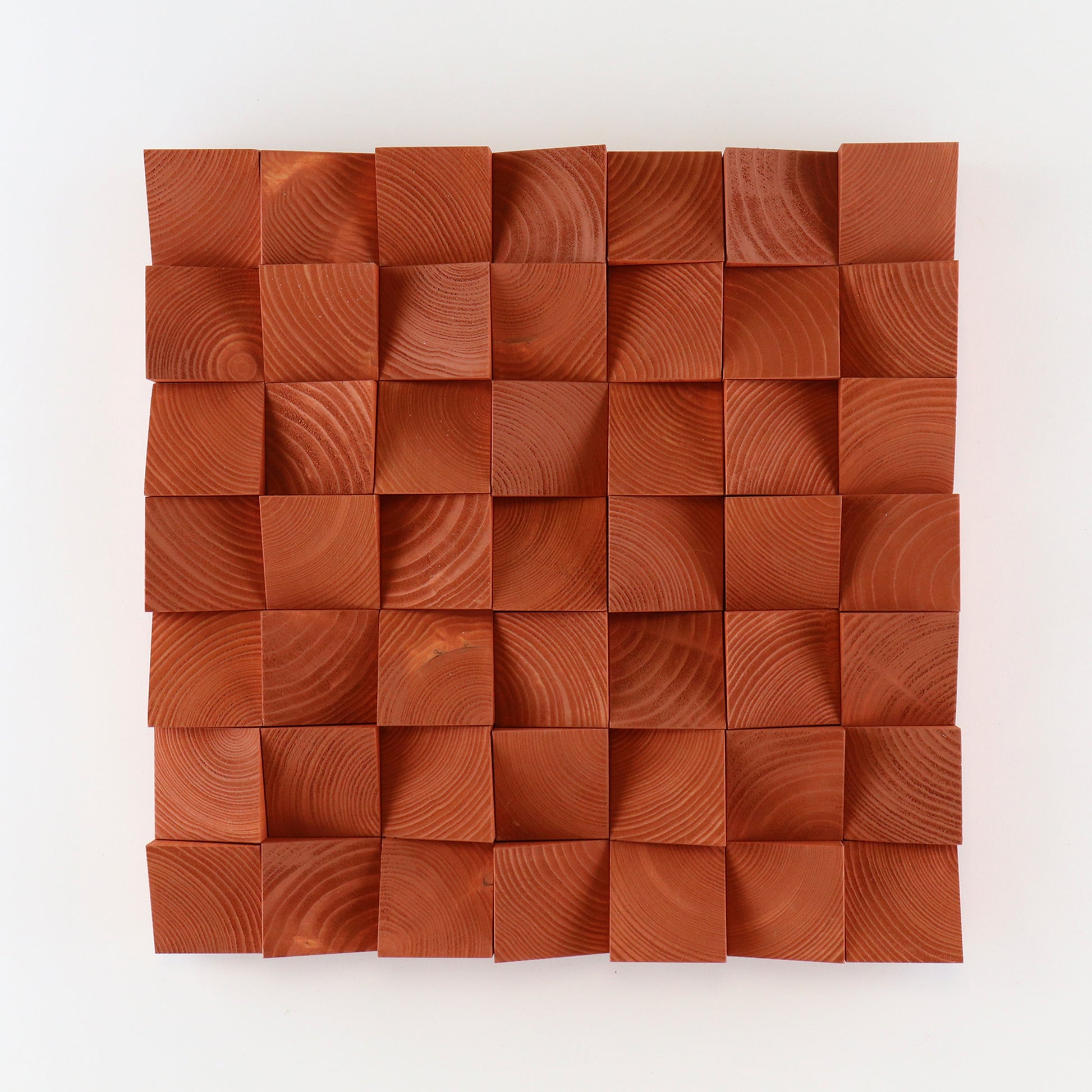 Handcrafted copper-toned wooden wall décor featuring natural grain.