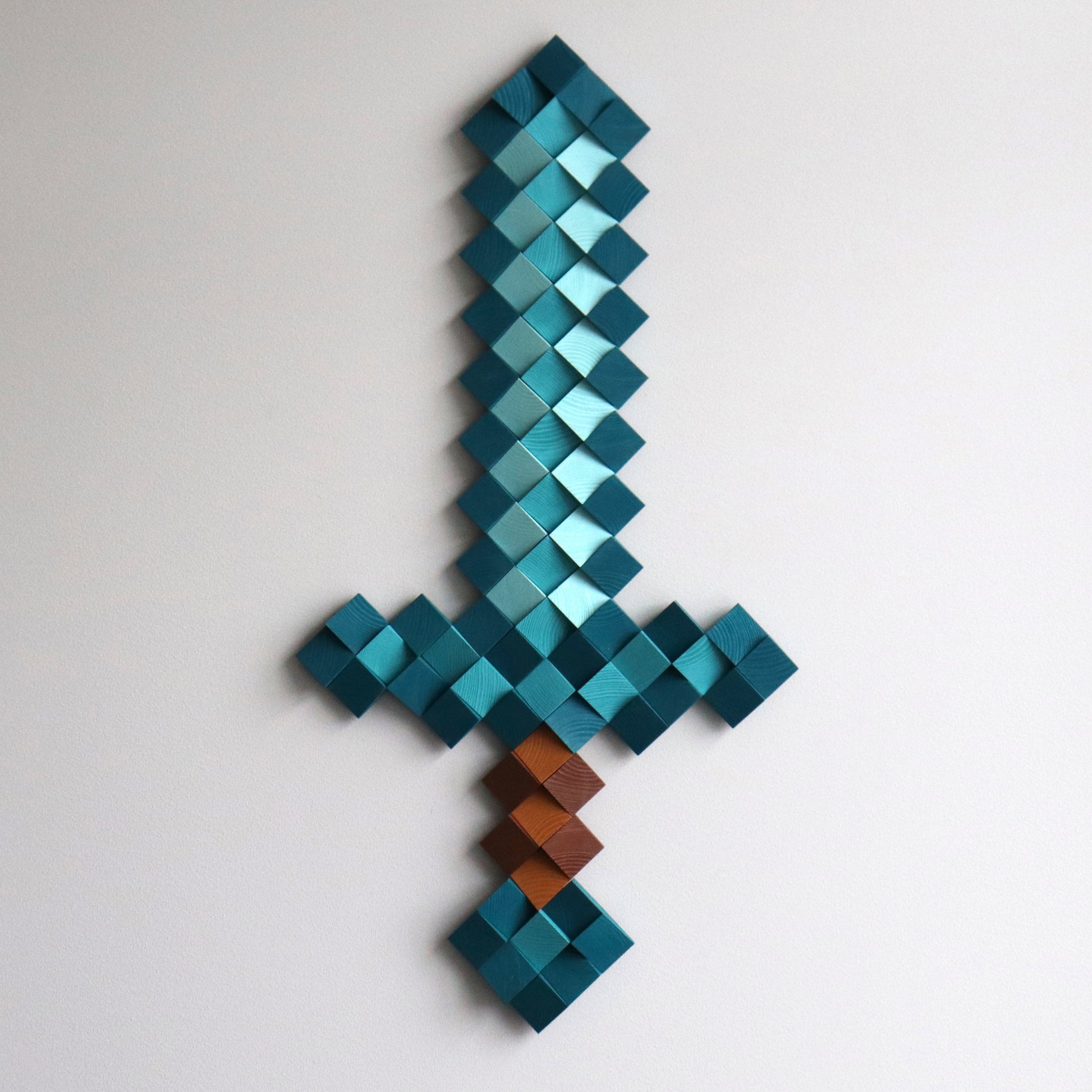 Modern Minecraft diamond sword wall decor crafted from painted wooden cubes